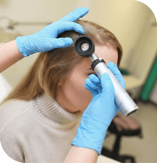 Dermatologist Examining Hair and Scalp with Dermatoscope Hair